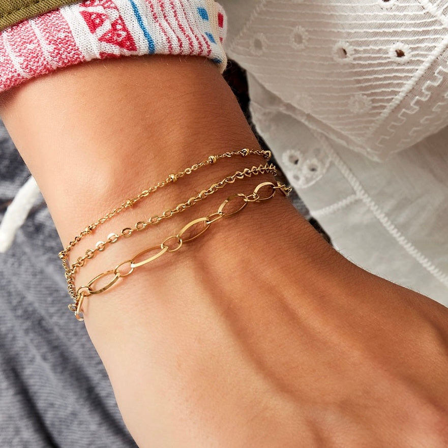 Armband schakel triple goud
