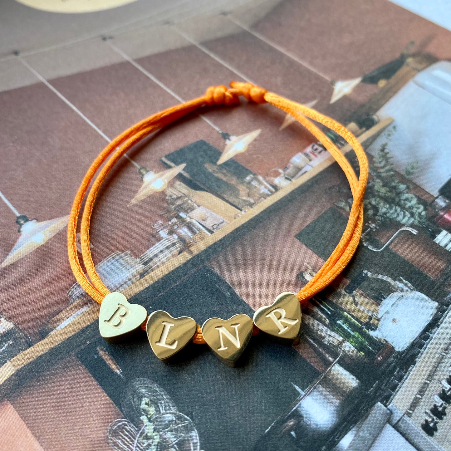 Armband hart multi letters goud/zilver